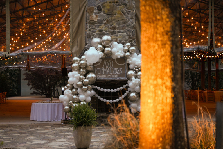 A sunset photo of a Greek Event at the Crooked Oaks pavilion.