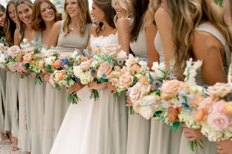 bridesmaids holding bridal bouquets